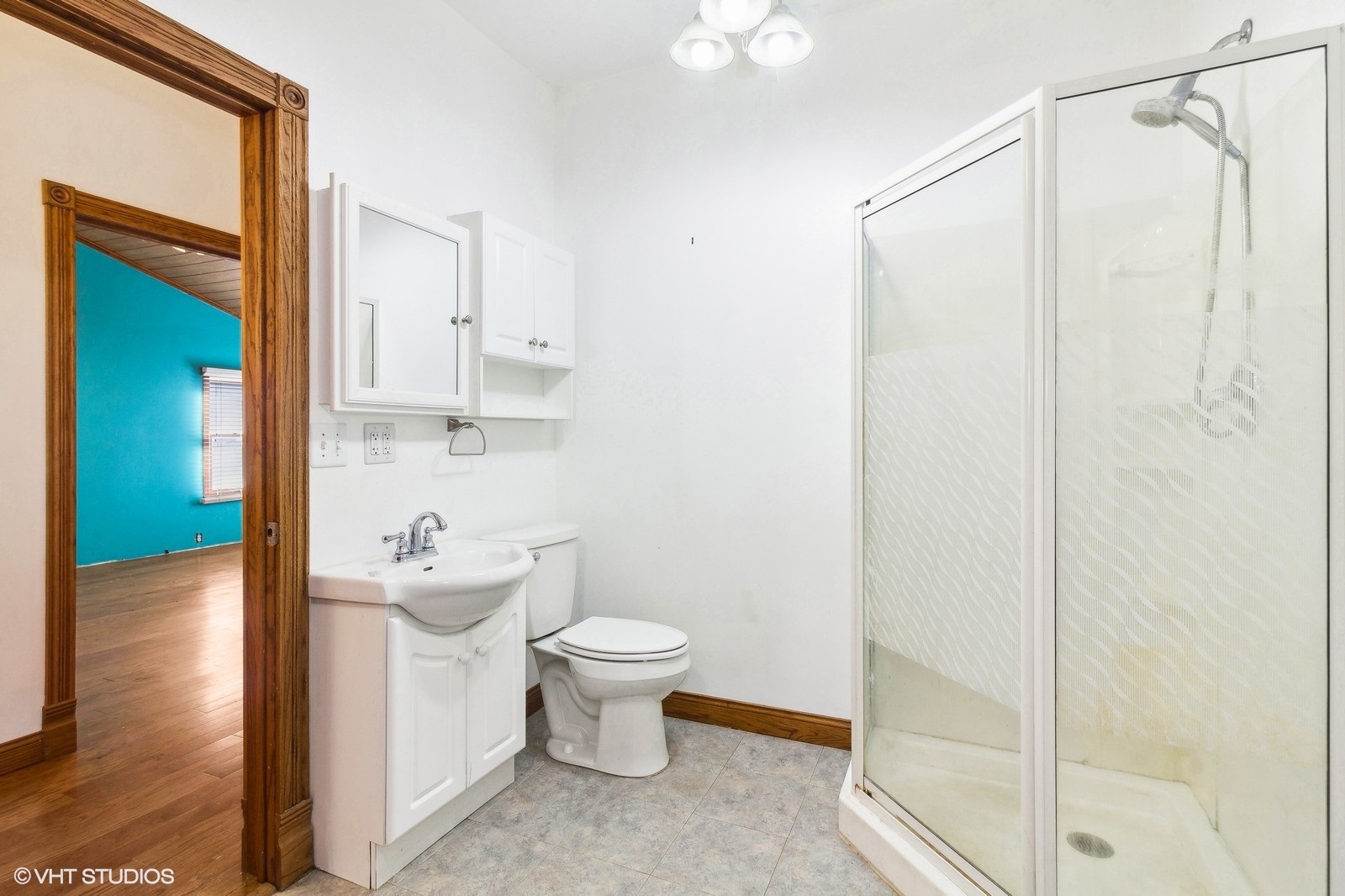 41 West 573 Lenz Road Elgin, IL 60124 - Photo 17 of 21 a bathroom with a toilet a sink and shower