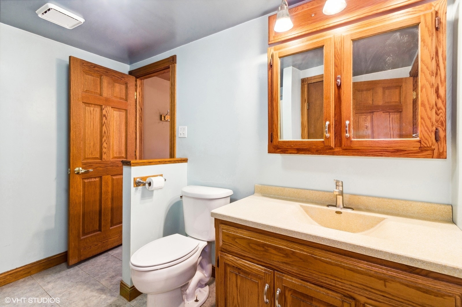 41 West 573 Lenz Road Elgin, IL 60124 - Photo 18 of 21 a bathroom with a sink a toilet and shower