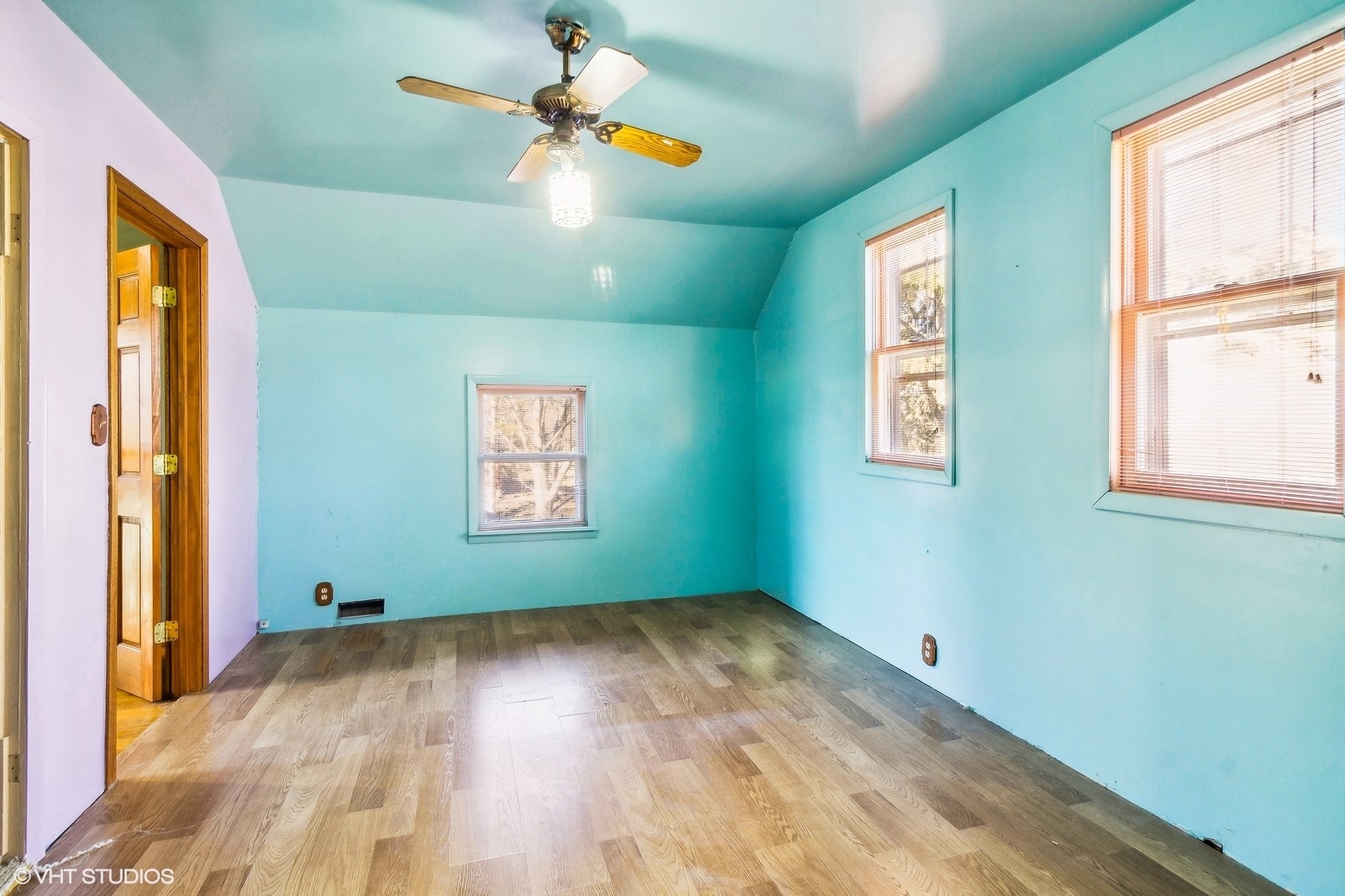 41 West 573 Lenz Road Elgin, IL 60124 - Photo 21 of 21 a view of empty room with wooden floor and fan