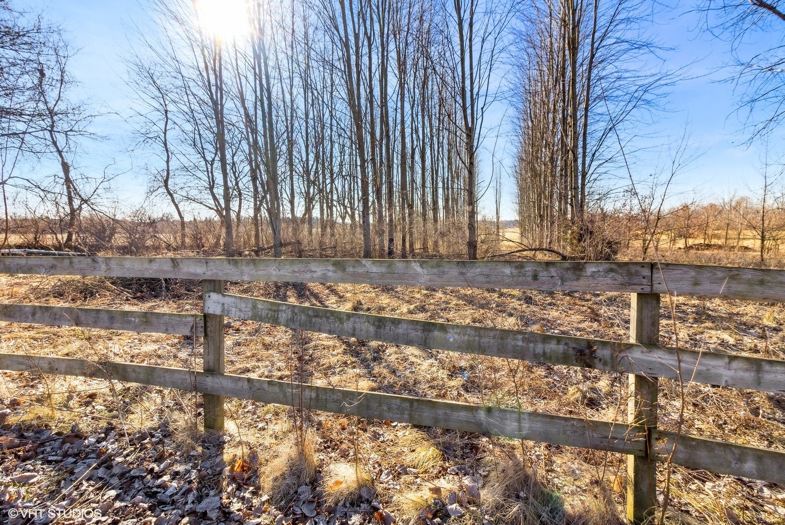 41 West 573 Lenz Road Elgin, IL 60124 - Photo 8 of 21 a view of a yard with wooden fence