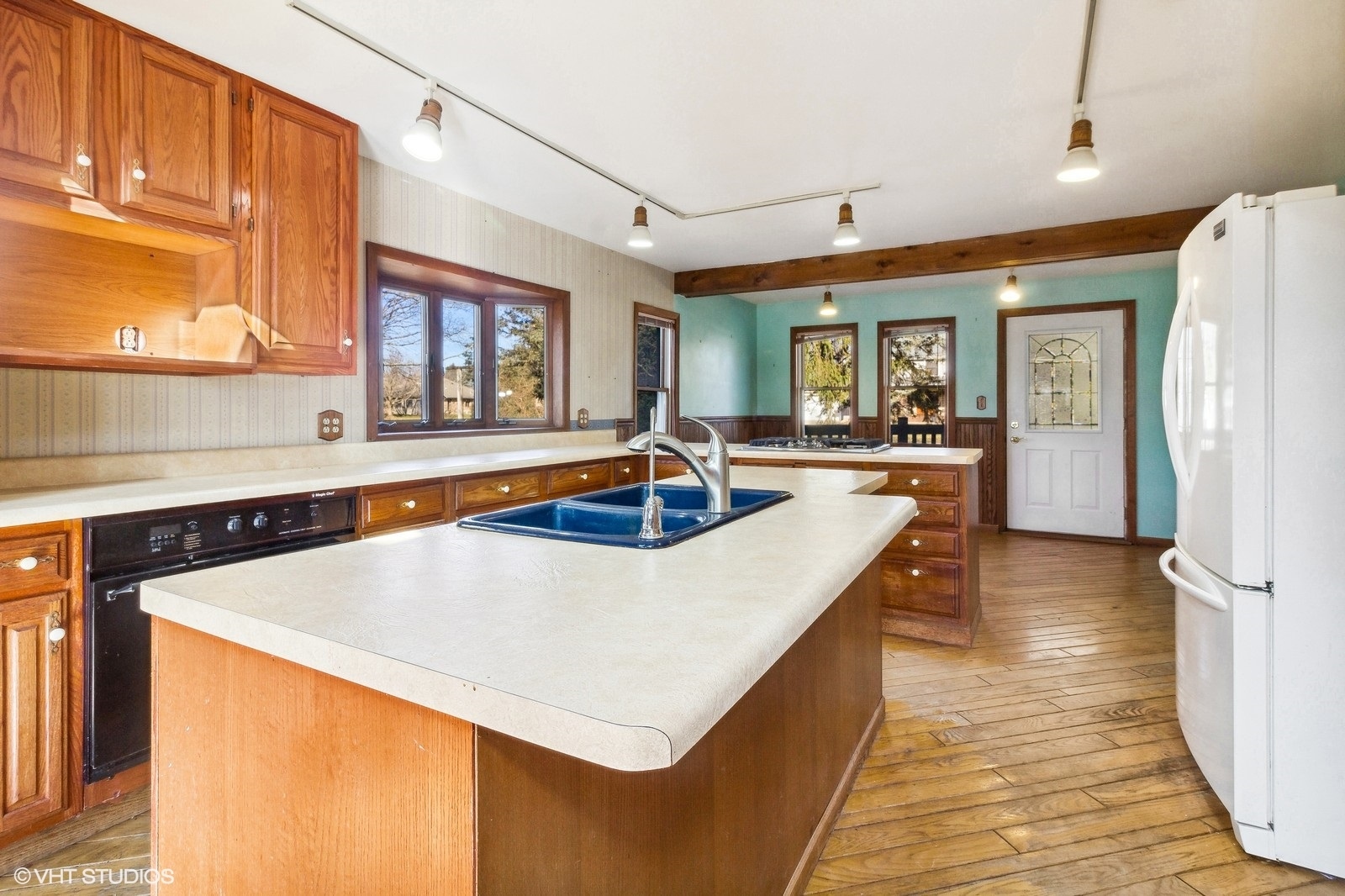 41 West 573 Lenz Road Elgin, IL 60124 - Photo 10 of 21 a kitchen with sink a refrigerator and wooden cabinets