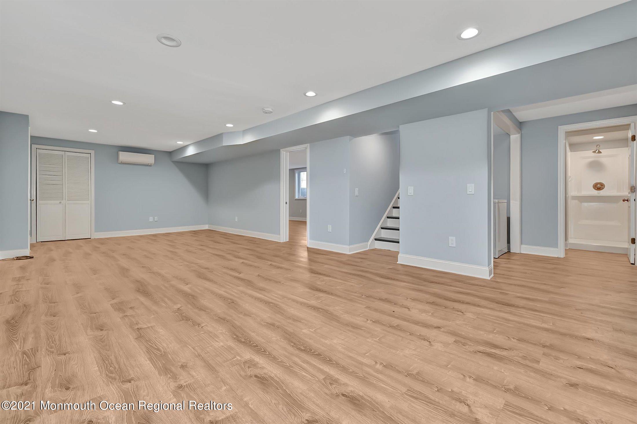32 Pine Road Howell, NJ 07731 - Photo 22 of 29 a view of empty room with wooden floor
