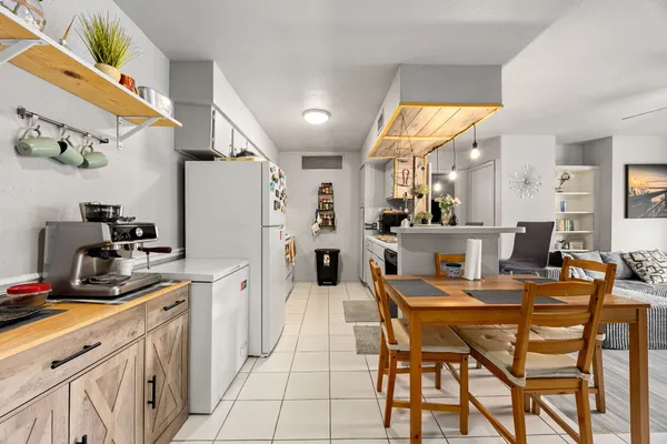 a kitchen with a sink and cabinets