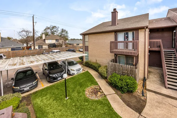 a view of a house with swimming pool