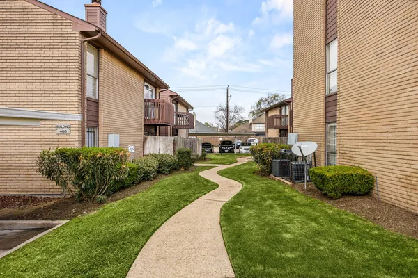 a view of a house with swimming pool