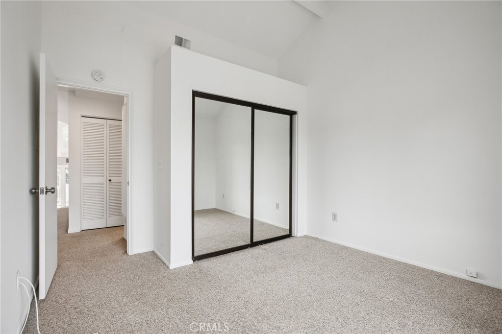 735 Wingate Bay, Unit 50 Costa Mesa, CA 92626 - Photo 17 of 32 a view of an empty room