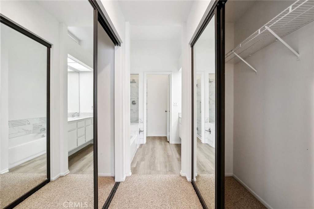 735 Wingate Bay, Unit 50 Costa Mesa, CA 92626 - Photo 21 of 32 a view of a hallway