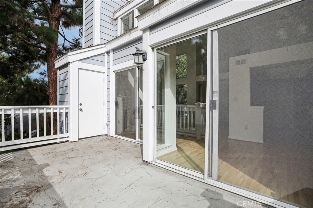 735 Wingate Bay, Unit 50 Costa Mesa, CA 92626 - Photo 26 of 32 a view of a glass door with a glass door