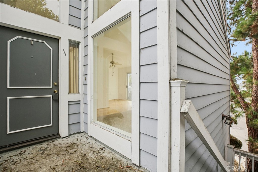 735 Wingate Bay, Unit 50 Costa Mesa, CA 92626 - Photo 3 of 32 a view of a back yard of a house