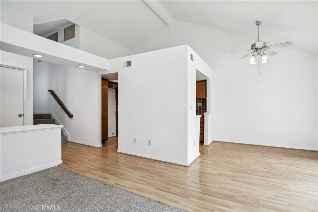 735 Wingate Bay, Unit 50 Costa Mesa, CA 92626 - Photo 7 of 32 a view of empty room with wooden floor