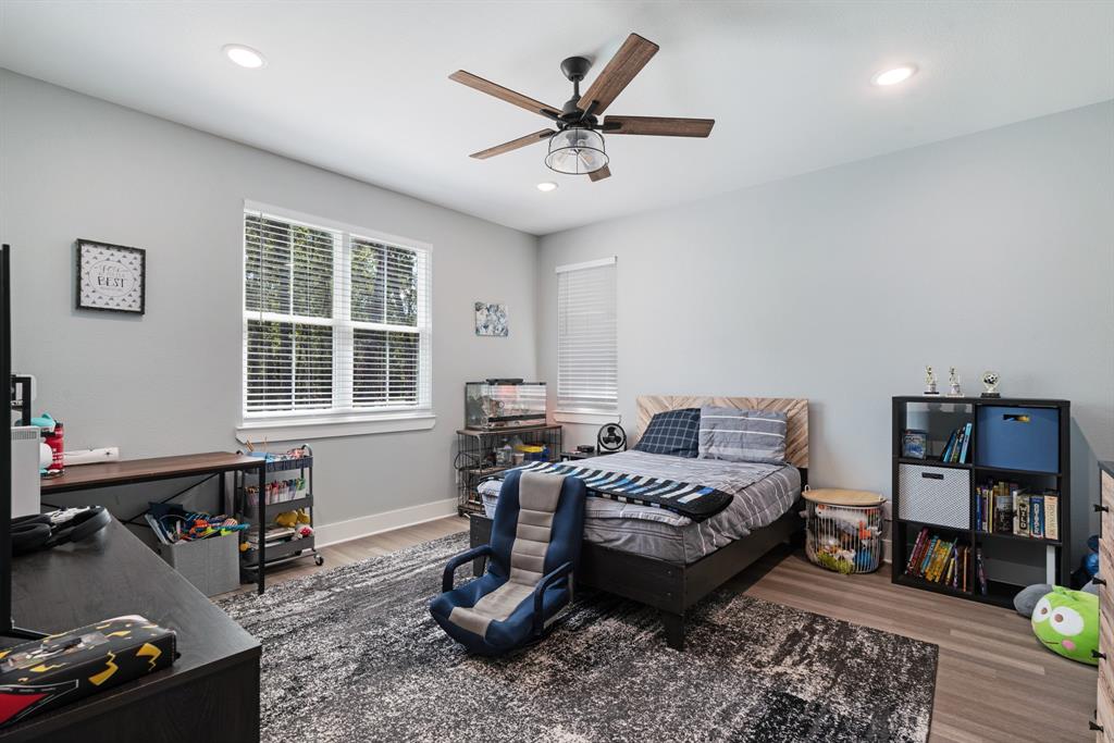 545 County Road Paris, TX 75462 - Photo 22 of 40 a bedroom with furniture and a window