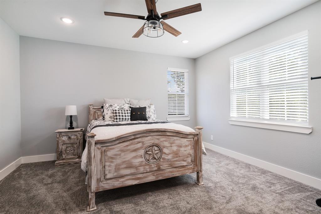 545 County Road Paris, TX 75462 - Photo 23 of 40 a bedroom with a bed and a window