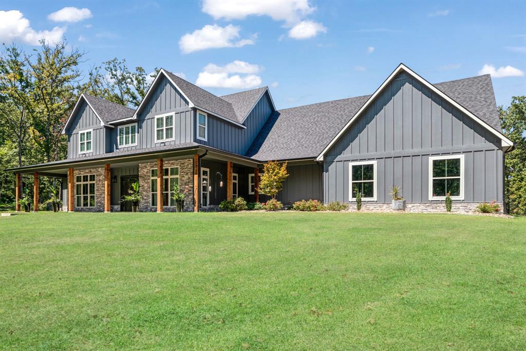 545 County Road Paris, TX 75462 - Photo 35 of 40 a front view of a house with a garden