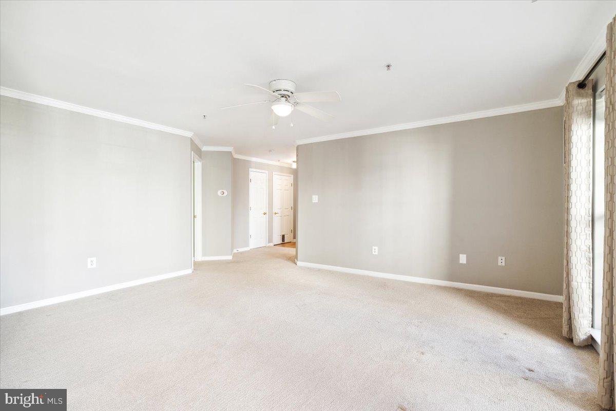 599 Cawley Drive, Unit 2A Frederick, MD 21703 - Photo 11 of 32 a view of an empty room with a window