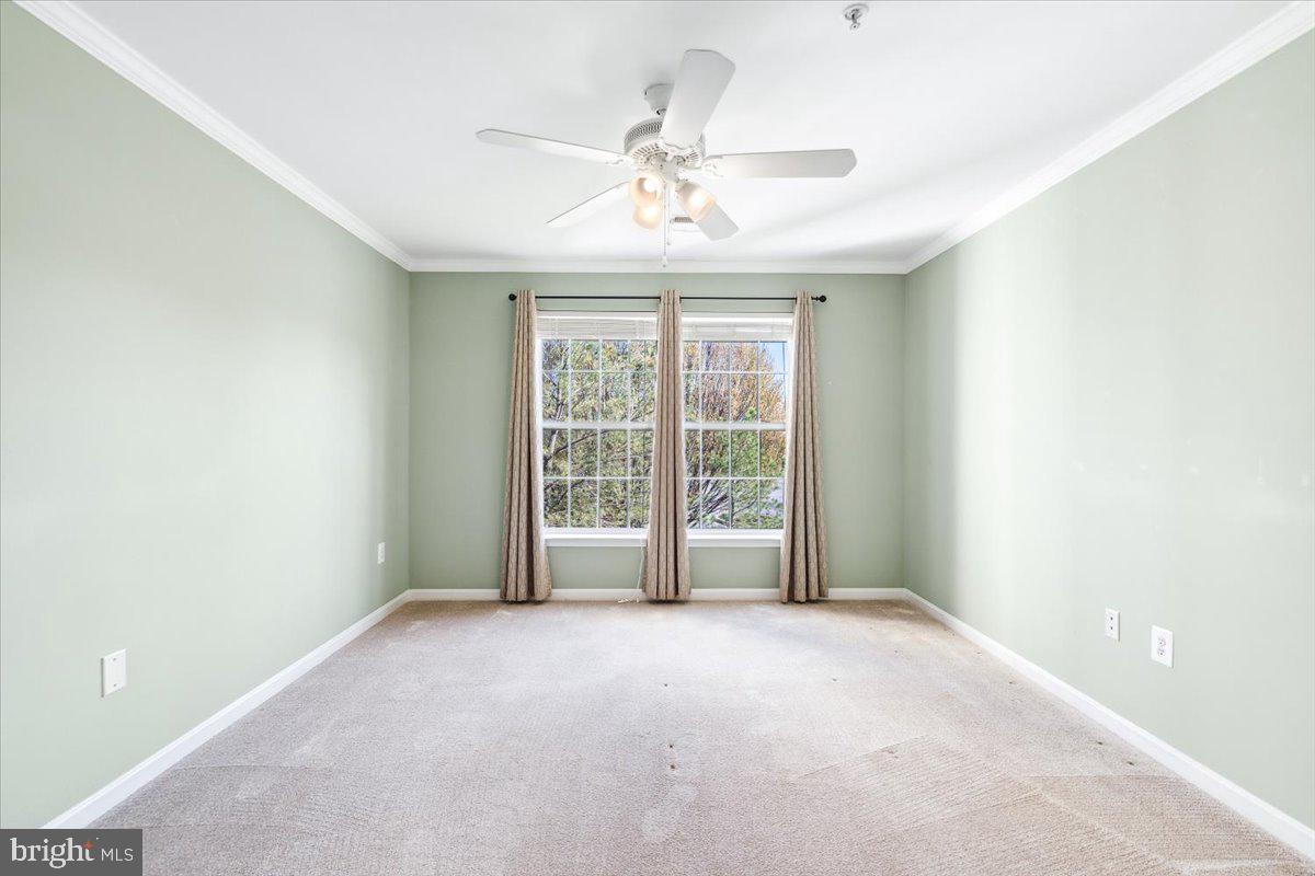599 Cawley Drive, Unit 2A Frederick, MD 21703 - Photo 30 of 32 a view of an empty room with a window