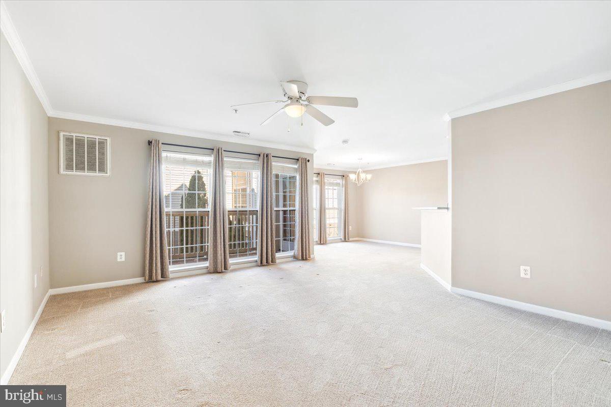 599 Cawley Drive, Unit 2A Frederick, MD 21703 - Photo 9 of 32 a view of an empty room with a window