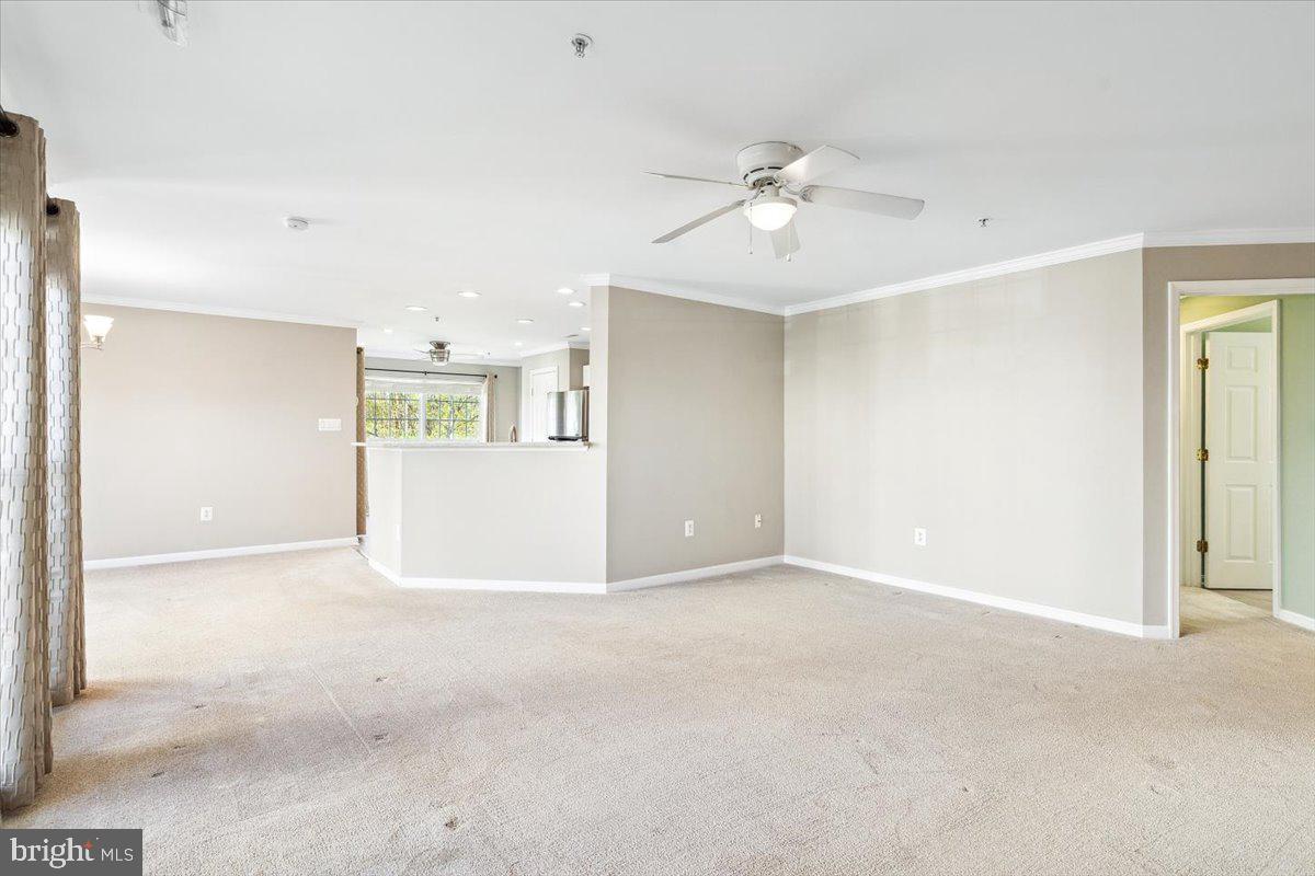 599 Cawley Drive, Unit 2A Frederick, MD 21703 - Photo 10 of 32 a view of an empty room with a window