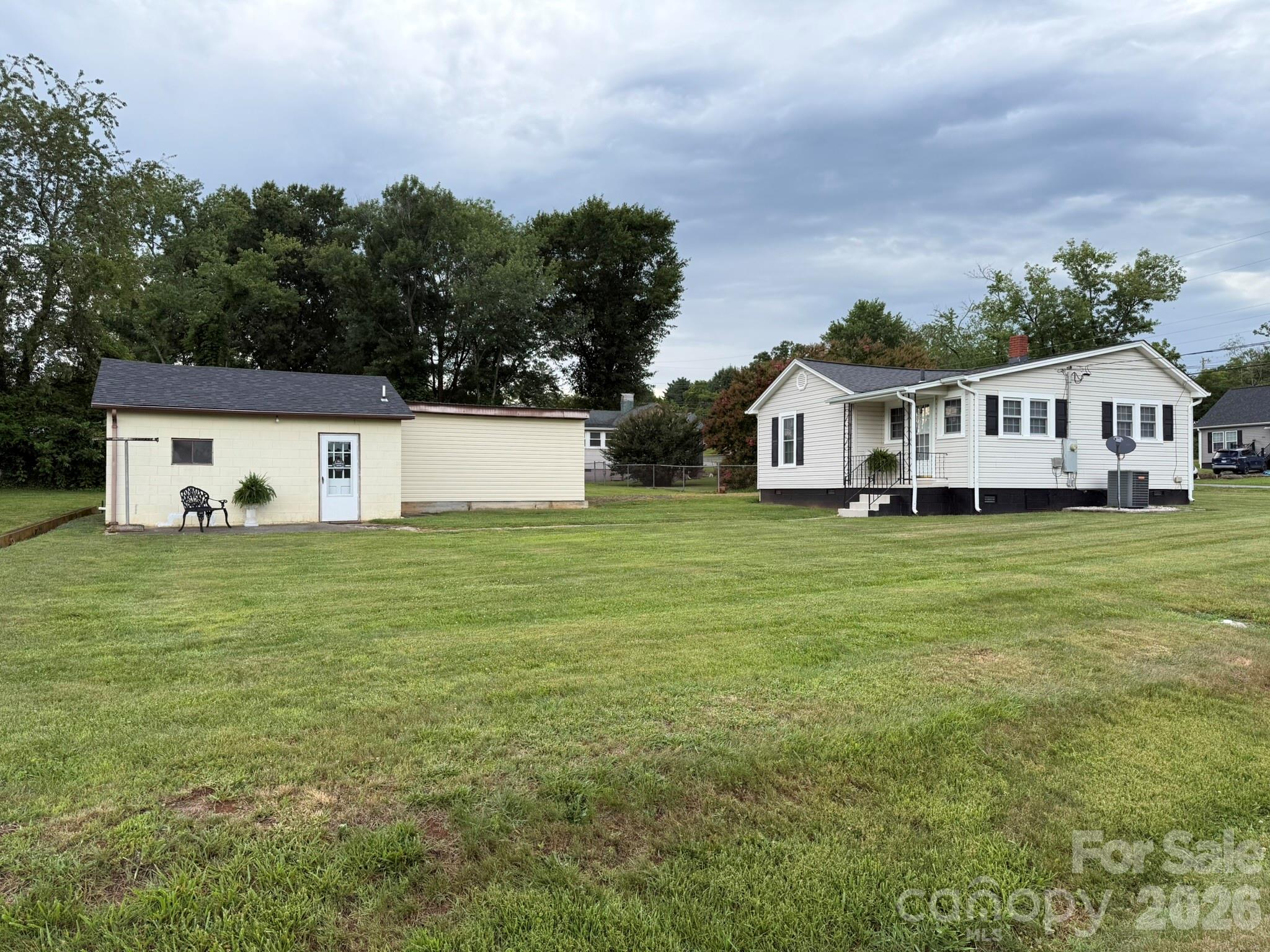 108 Fletcher Street Morganton, NC 28655 - Photo 3 of 29 a view of a house with a big yard