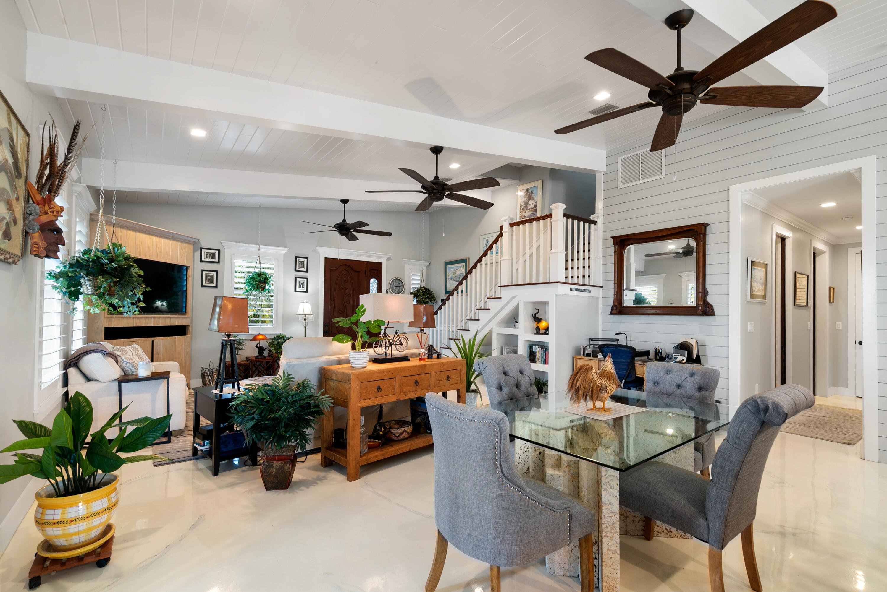 65 Tarpon Avenue Key Largo, FL 33037 - Photo 15 of 54 a dining room with furniture and a potted plant