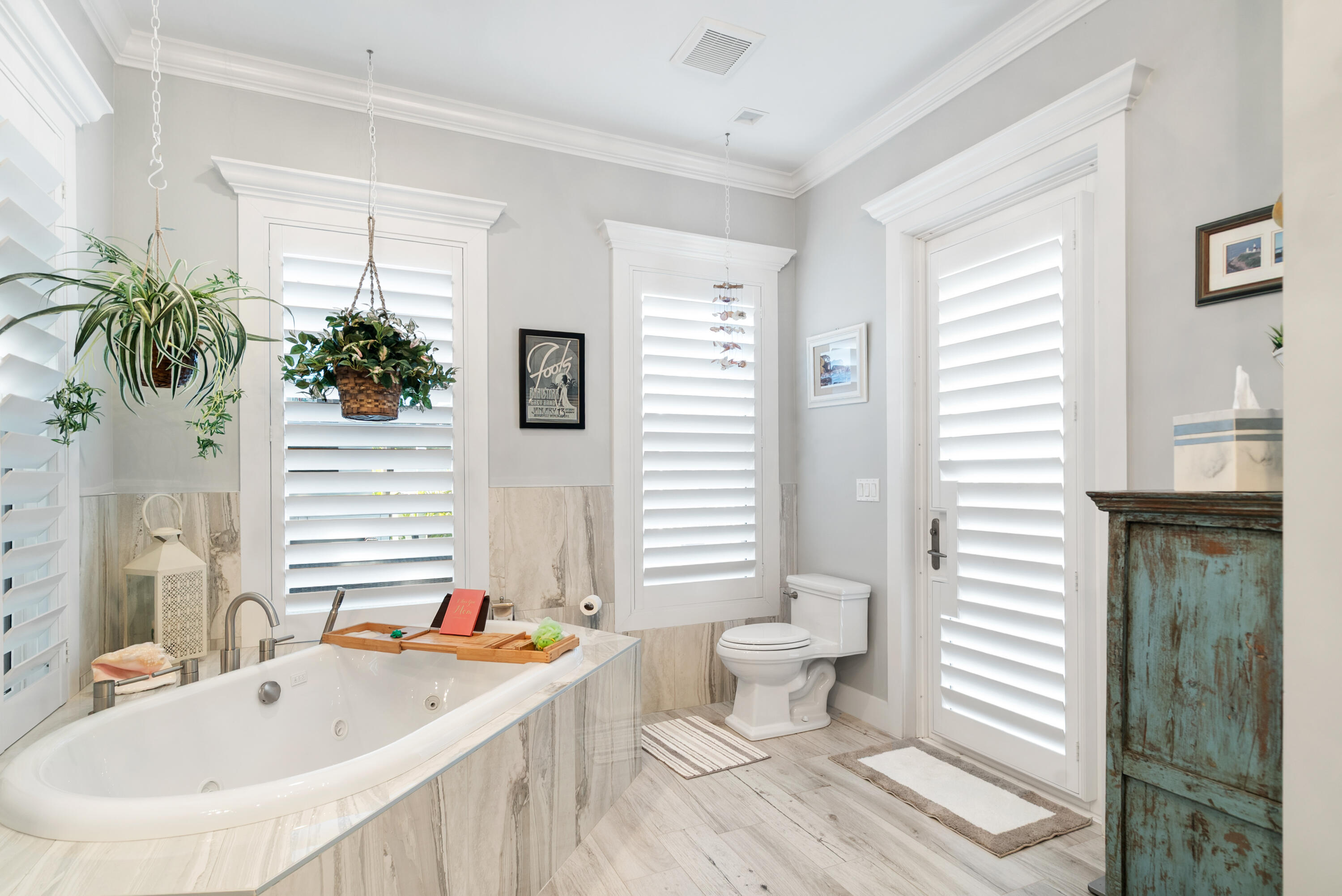 65 Tarpon Avenue Key Largo, FL 33037 - Photo 18 of 54 a bathroom with a sink a toilet and a window