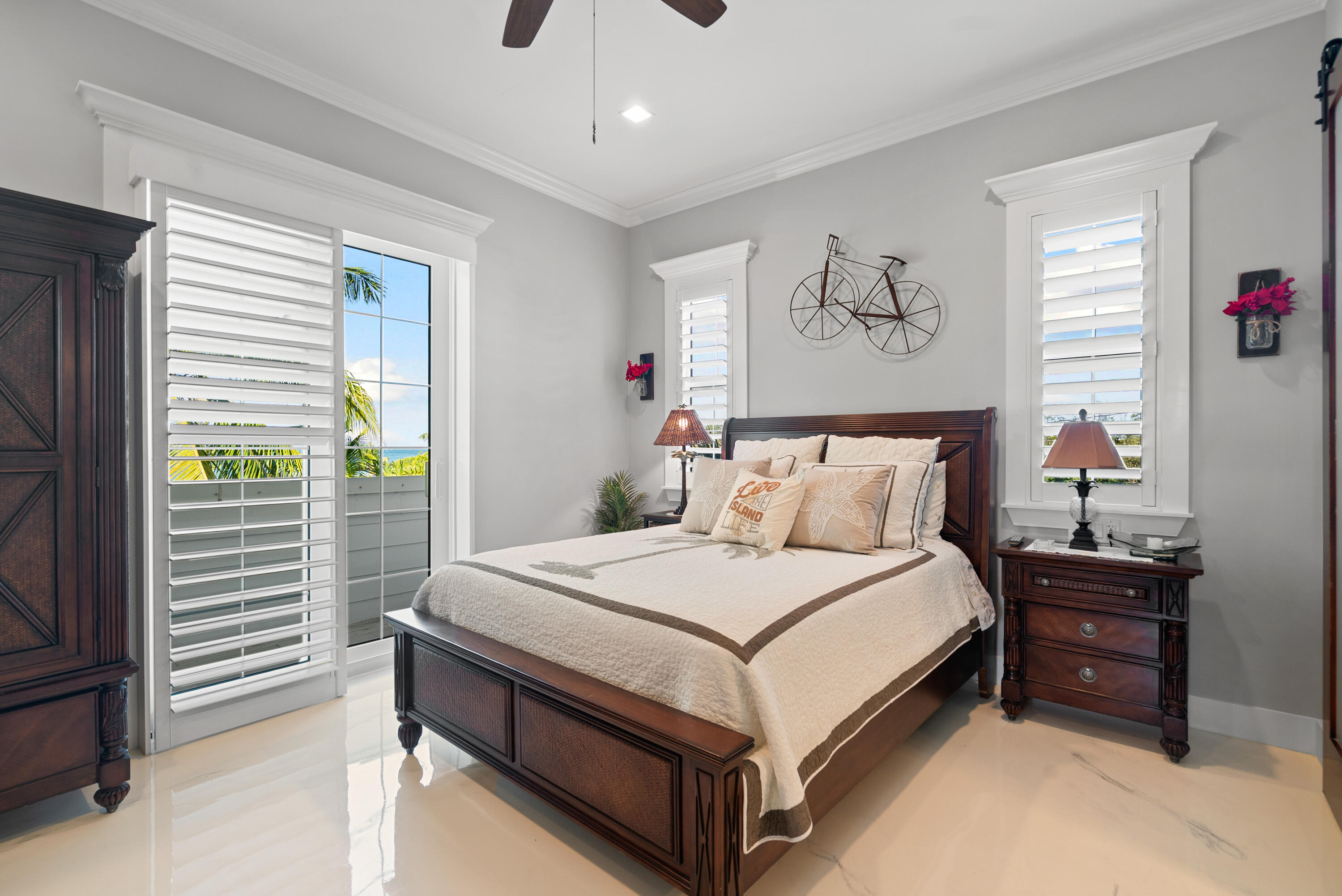 65 Tarpon Avenue Key Largo, FL 33037 - Photo 21 of 54 a bedroom with a bed and a window