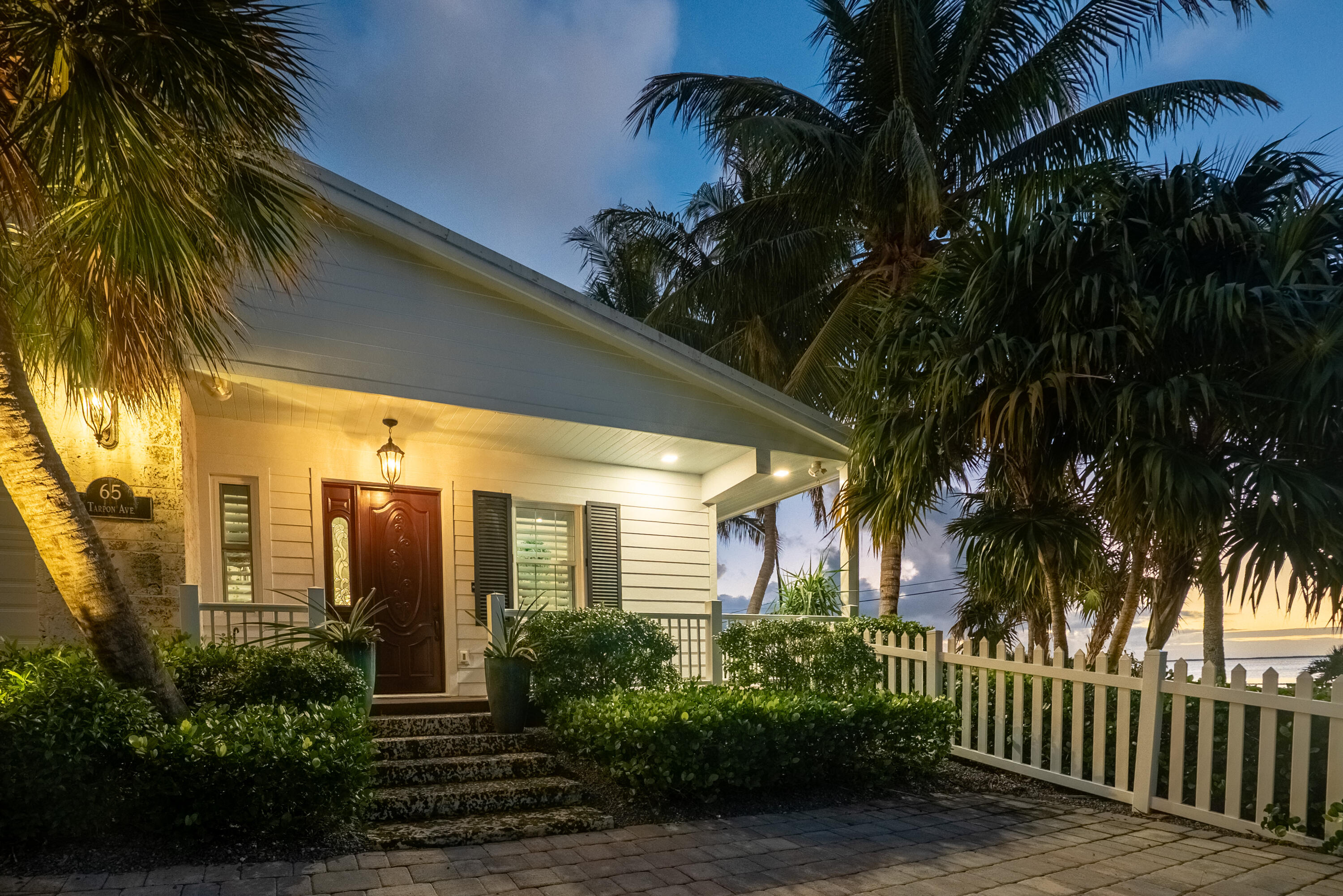 65 Tarpon Avenue Key Largo, FL 33037 - Photo 40 of 54 a front view of a house having yard