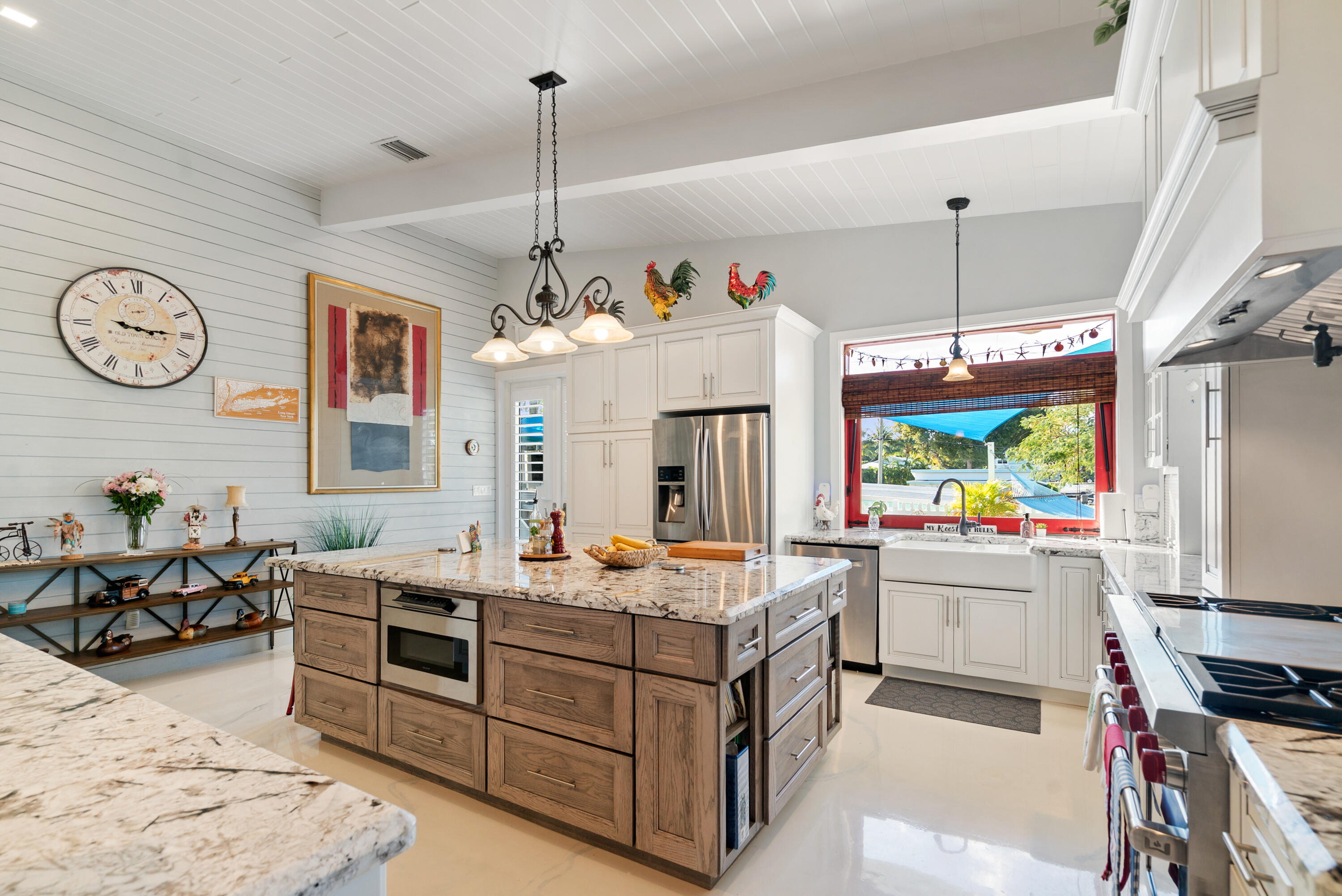 65 Tarpon Avenue Key Largo, FL 33037 - Photo 4 of 54 a open kitchen with stainless steel appliances granite countertop a stove and a refrigerator