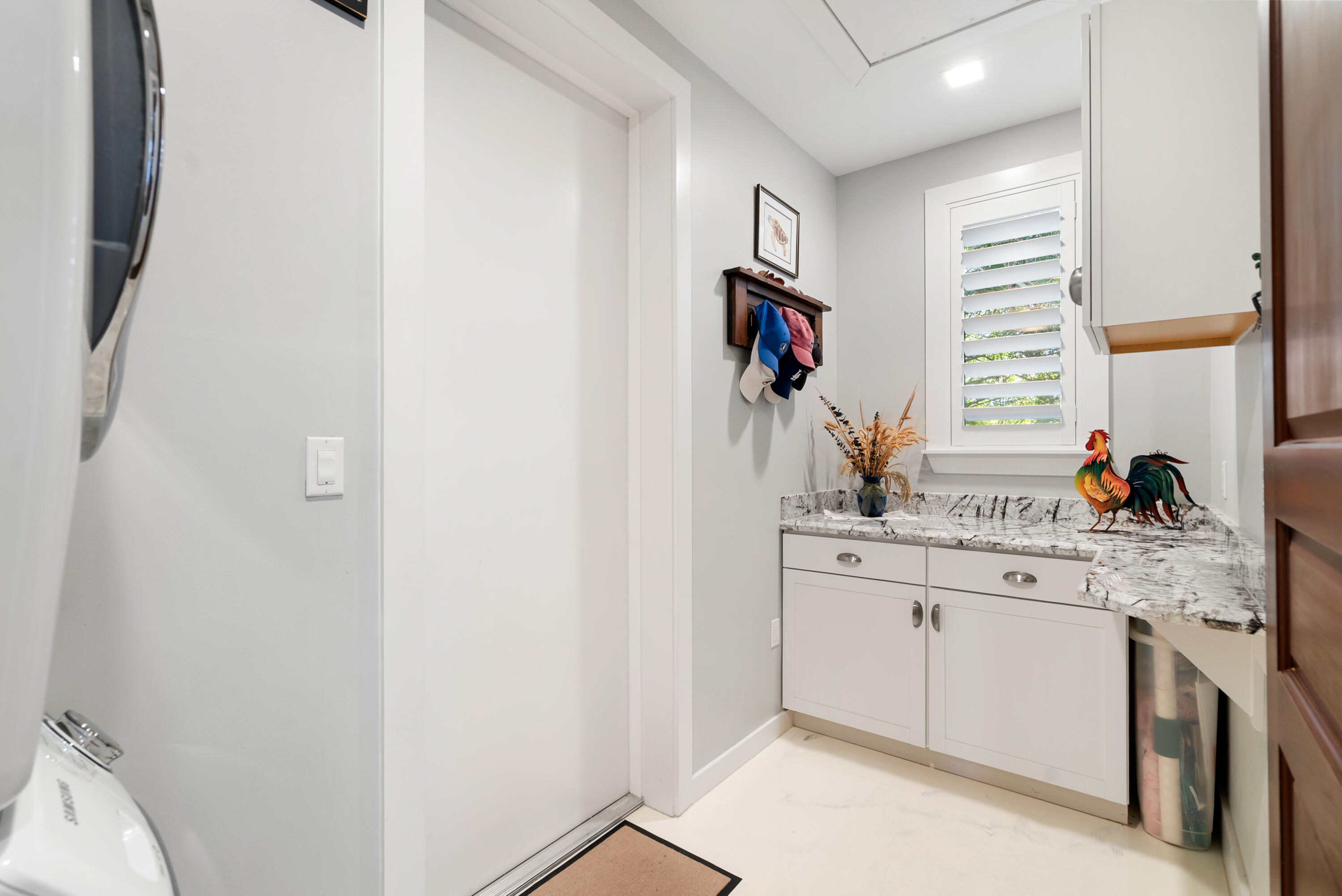 65 Tarpon Avenue Key Largo, FL 33037 - Photo 51 of 54 a kitchen with a sink cabinets and window