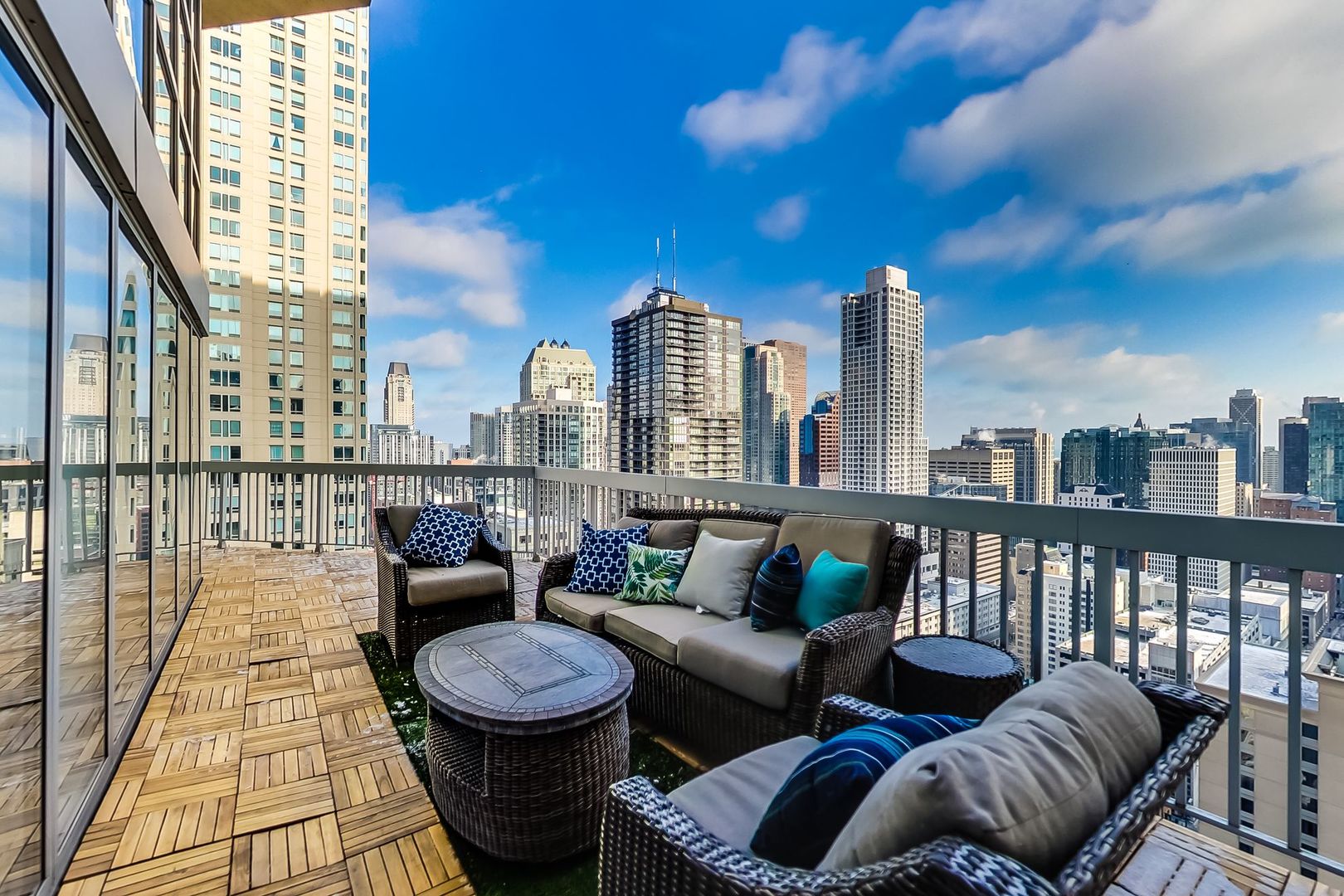 545 North Dearborn Street, Unit 3603 Chicago, IL 60654 - Photo 13 of 42 a balcony with furniture and a potted plant
