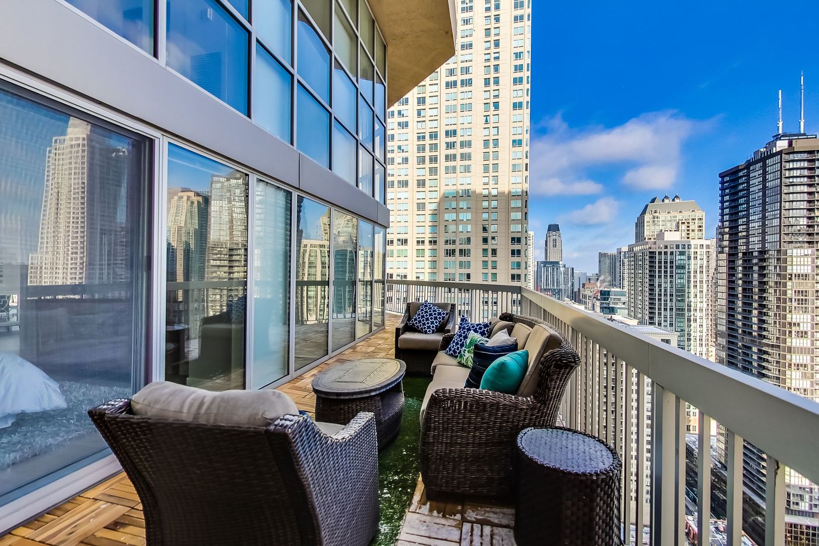 545 North Dearborn Street, Unit 3603 Chicago, IL 60654 - Photo 14 of 42 a view of balcony with couch and chairs