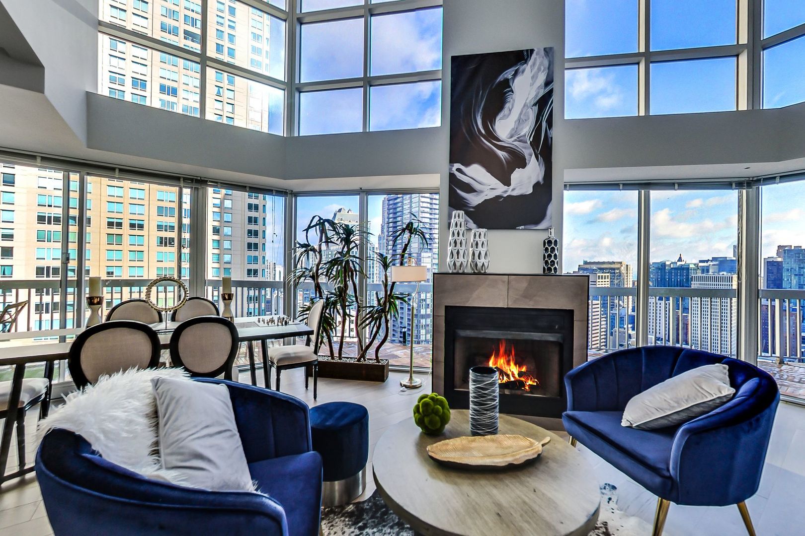 545 North Dearborn Street, Unit 3603 Chicago, IL 60654 - Photo 3 of 42 a living room with furniture and a fireplace