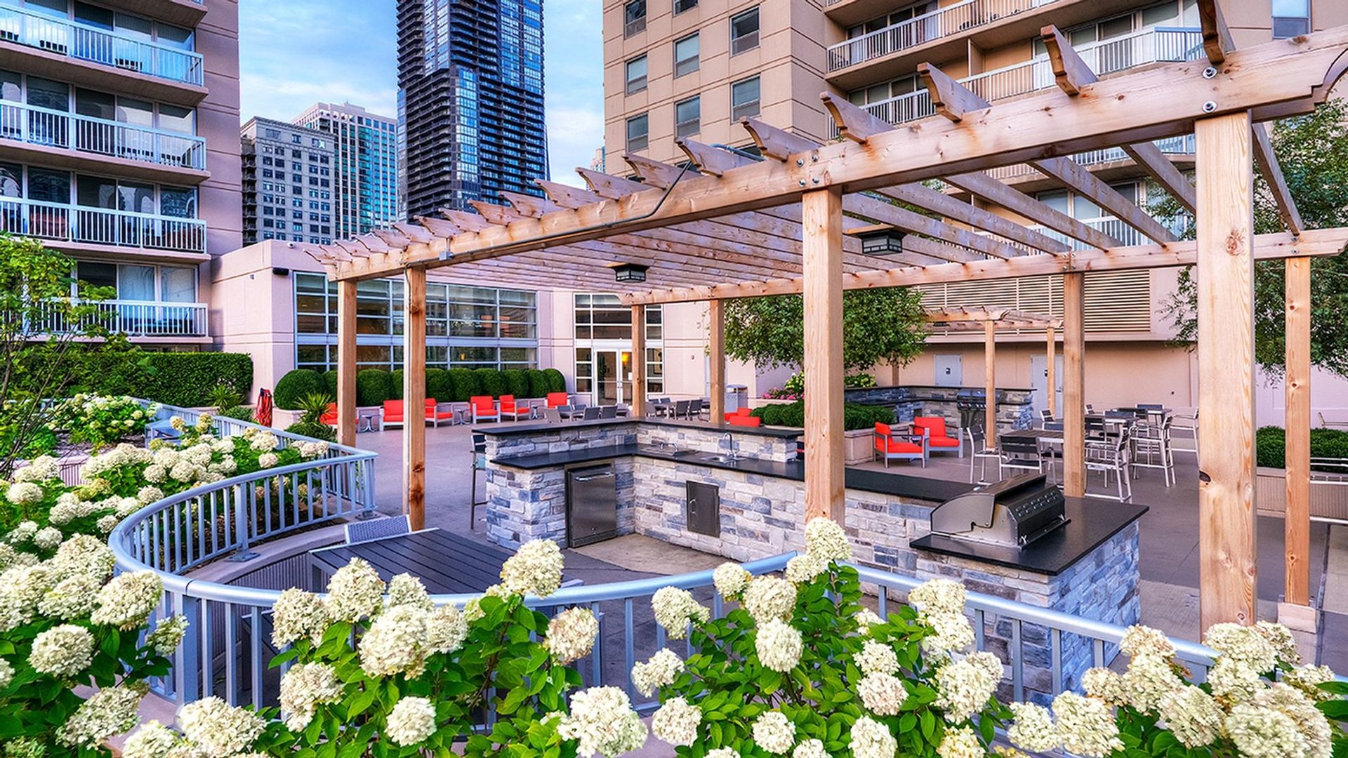 545 North Dearborn Street, Unit 3603 Chicago, IL 60654 - Photo 32 of 42 a view of a patio with couches table and chairs and potted plants