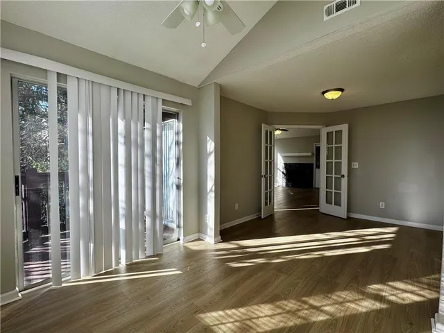 a view of a livingroom with a swimming pool