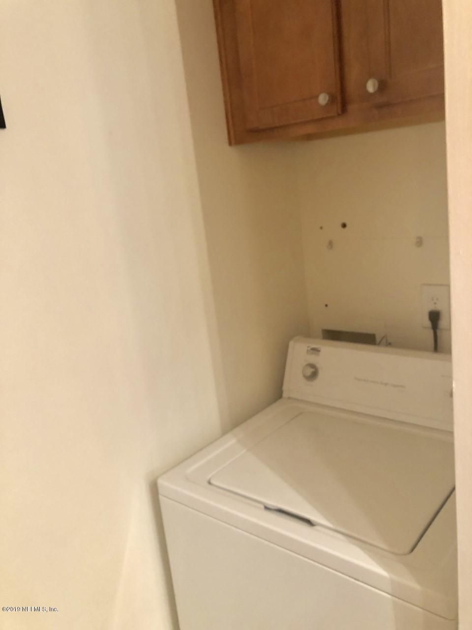 3737 Loretto Road, Unit 505 Jacksonville, FL 32223 - Photo 11 of 15 a utility room with dryer and washer