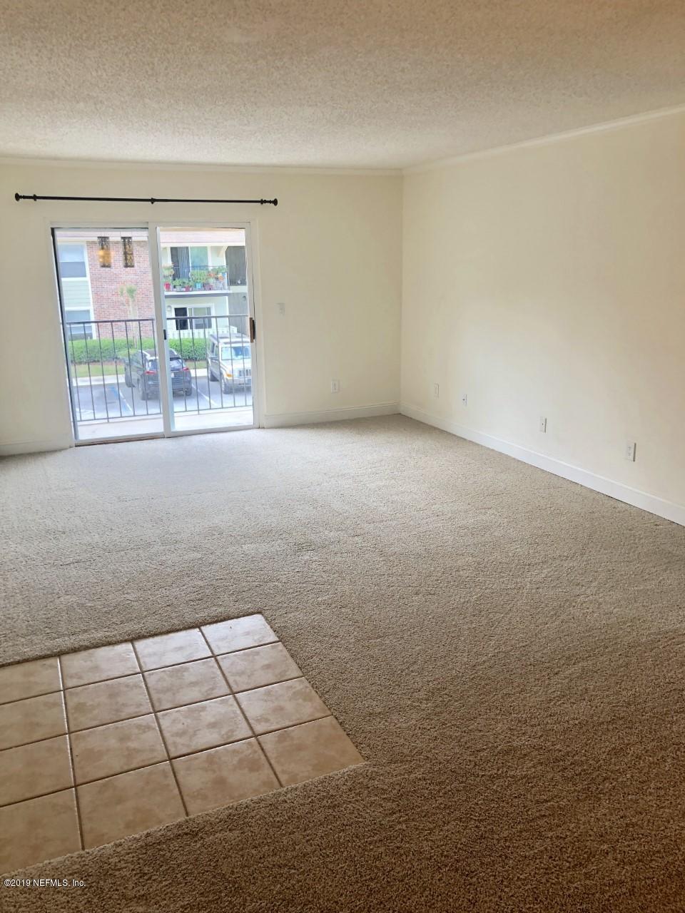 3737 Loretto Road, Unit 505 Jacksonville, FL 32223 - Photo 6 of 15 a view of an empty room with a window