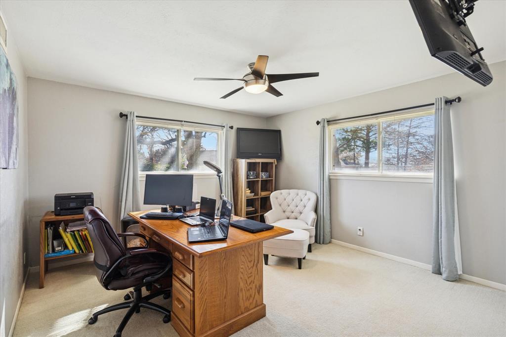 6001 Jacqueline Road Fort Worth, TX 76112 - Photo 18 of 26 a view of a workspace with furniture and a window