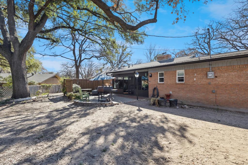 6001 Jacqueline Road Fort Worth, TX 76112 - Photo 25 of 26 a view of a house with a patio