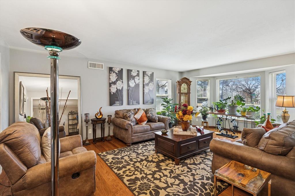 6001 Jacqueline Road Fort Worth, TX 76112 - Photo 5 of 26 a living room with furniture and a large window