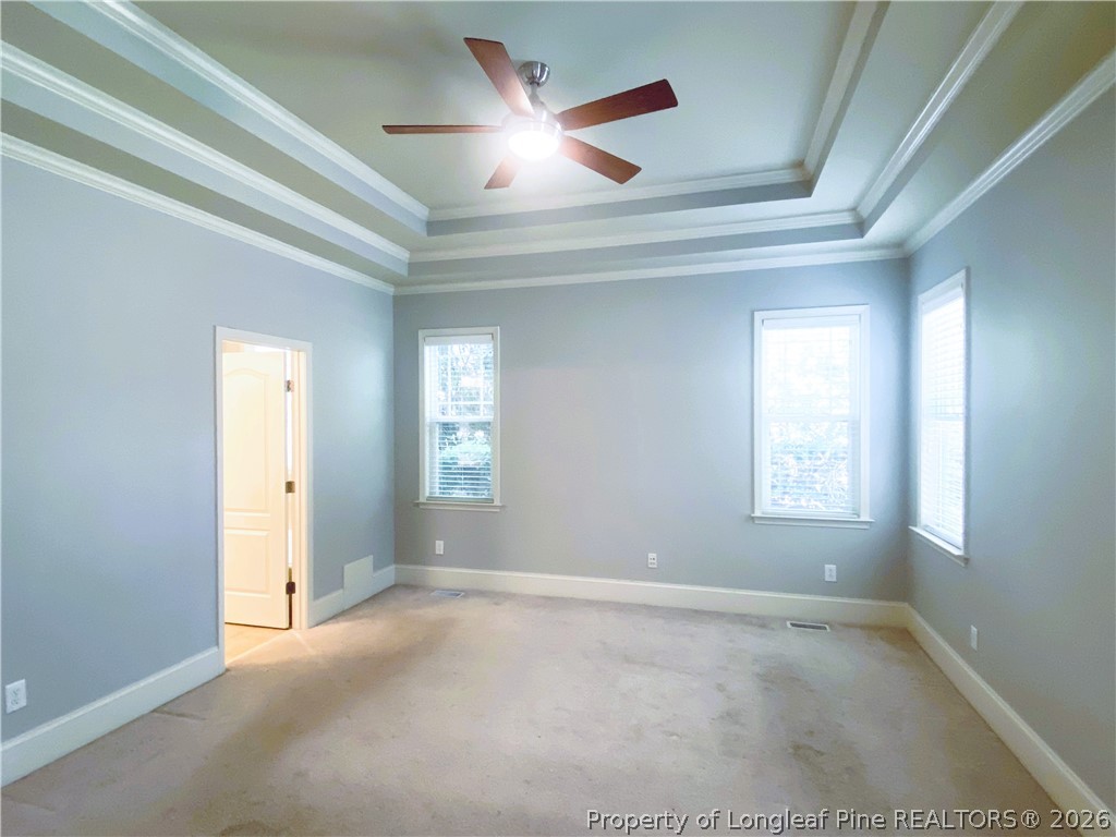 175 Pine Hawk Drive Spring Lake, NC 28390 - Photo 15 of 43 a view of a livingroom with a ceiling fan and window