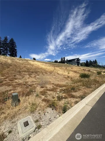 a view of swimming pool from a balcony
