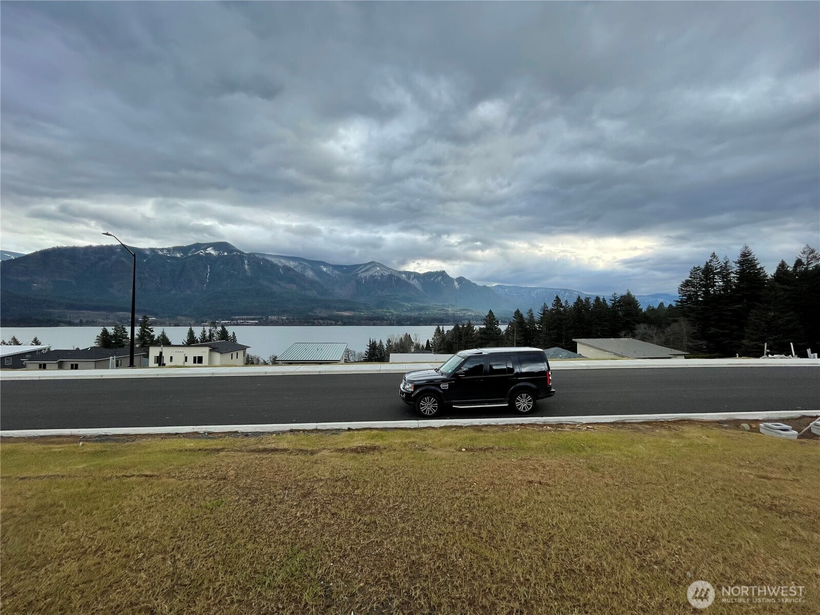 145 Upper Basso Circle Stevenson, WA 98648 - Photo 3 of 5 a view of a swimming pool and an outdoor seating