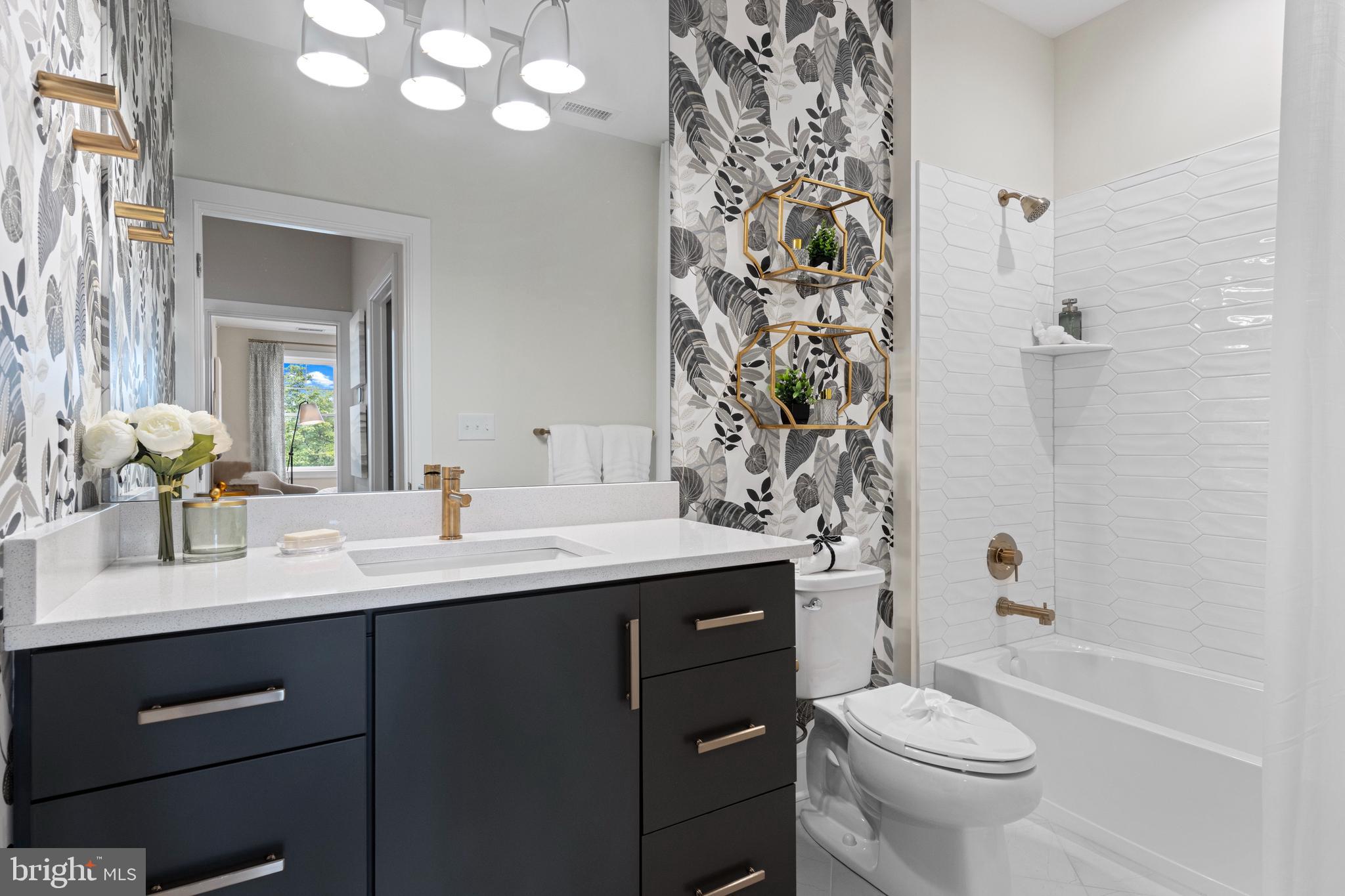 428 Reagans Lane Chalfont, PA 18914 - Photo 12 of 16 a bathroom with a double vanity sink toilet and shower