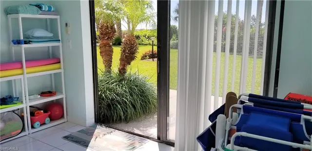 a swimming pool with outdoor seating and yard