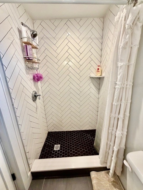 366 Hanover Street, Unit 4 Boston, MA 02113 - Photo 10 of 14 a bathroom with a sink and a shower