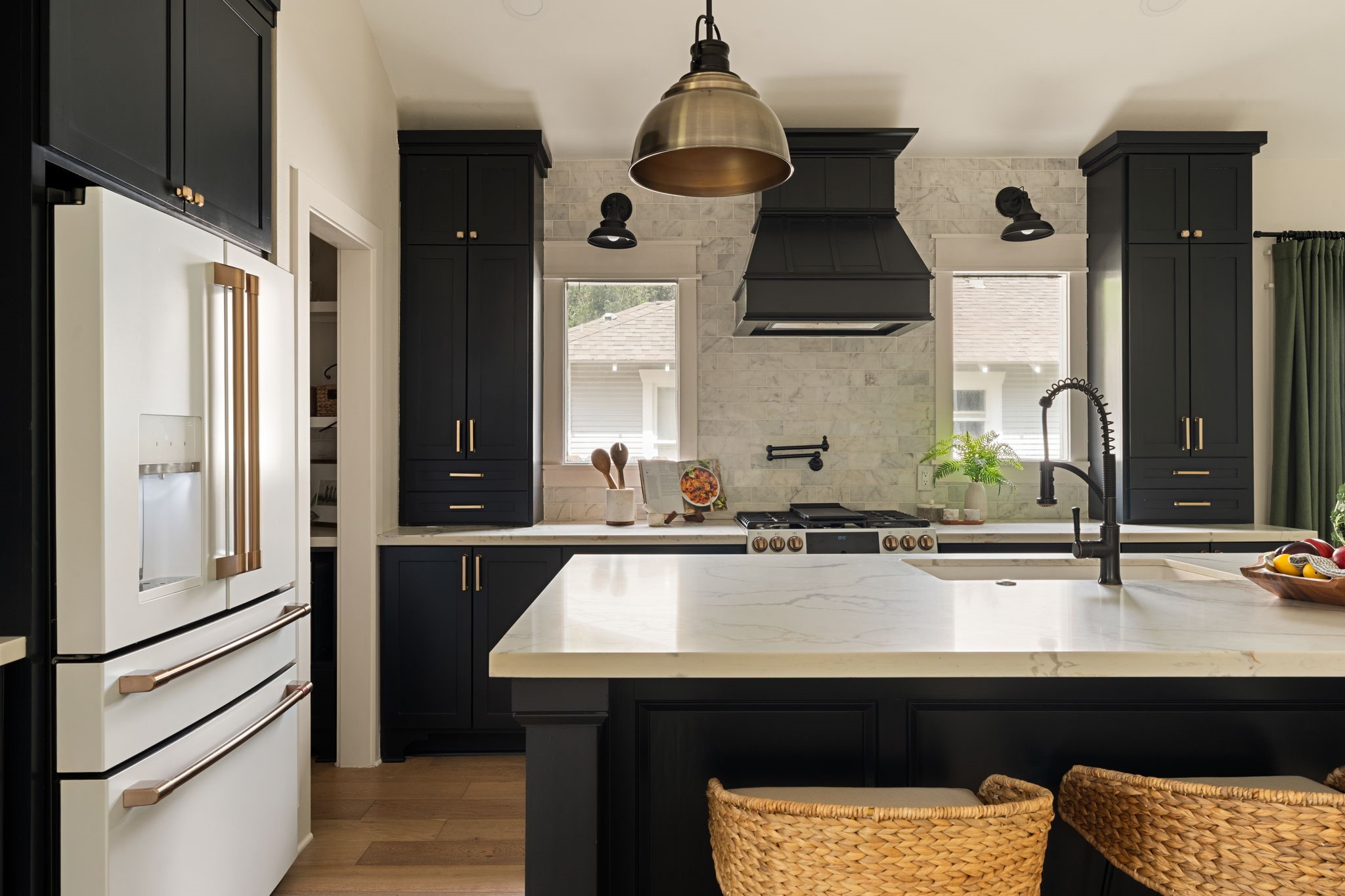 1022 Key Street Houston, TX 77009 - Photo 9 of 30 A suite of designer GE Cafe appliances in a stunning matte finish with signature bronze hardware is a dream.