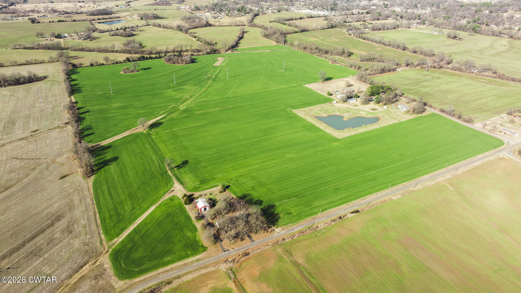 7-12 Sunny Hill Road Bells, TN 38006 - Photo 26 of 30 a view of a golf course with a lake