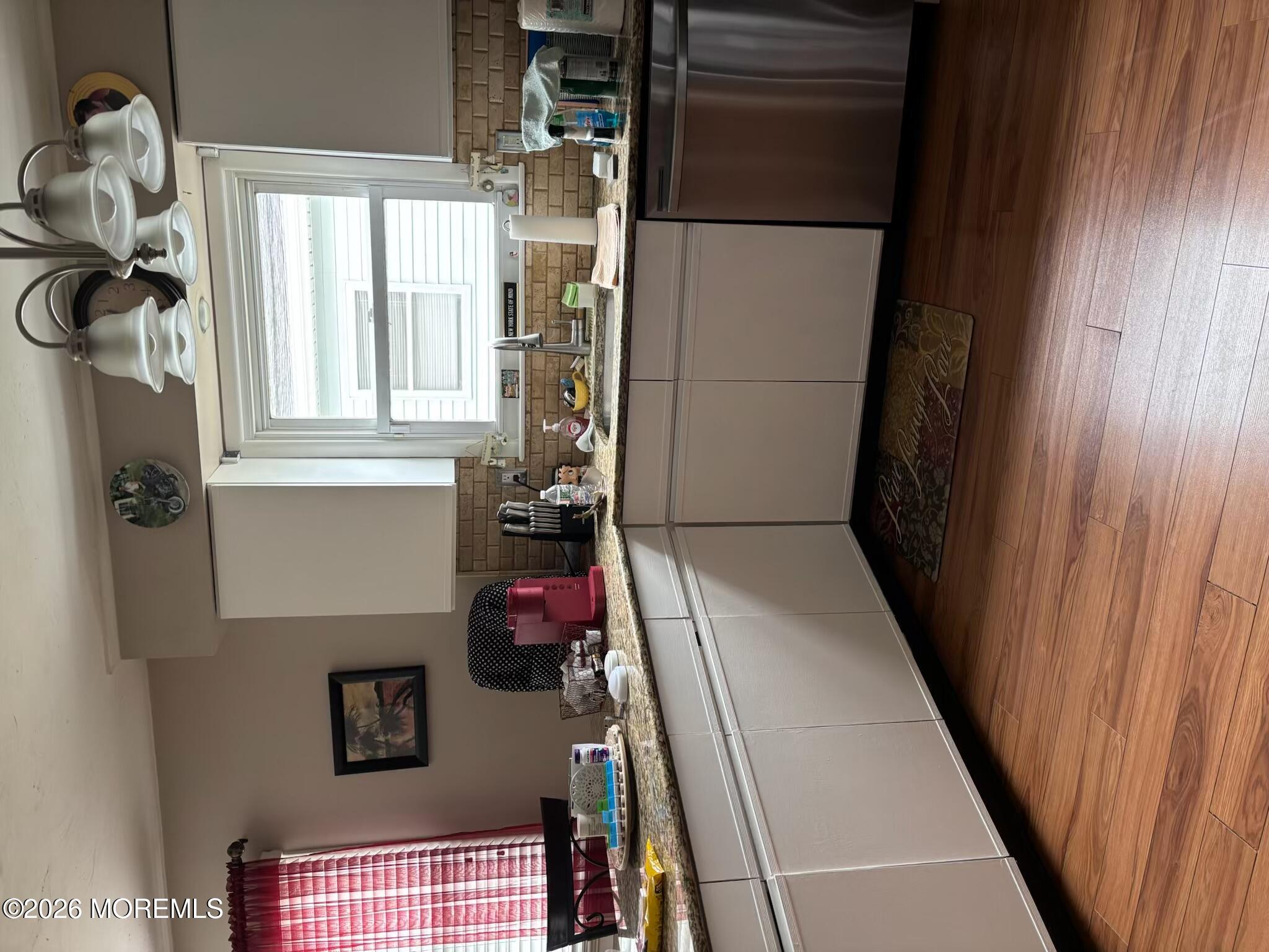 130 Courtshire Drive Brick, NJ 08723 - Photo 27 of 27 a bathroom with a toilet and a shower