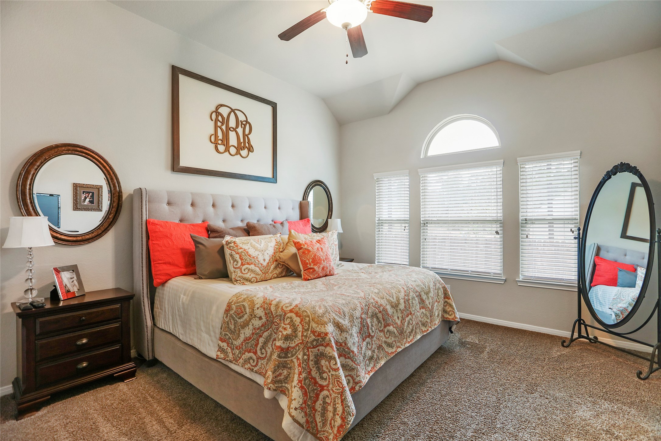 14141 Isle Royal Lane Conroe, TX 77384 - Photo 23 of 39 a bedroom with a bed and a large window