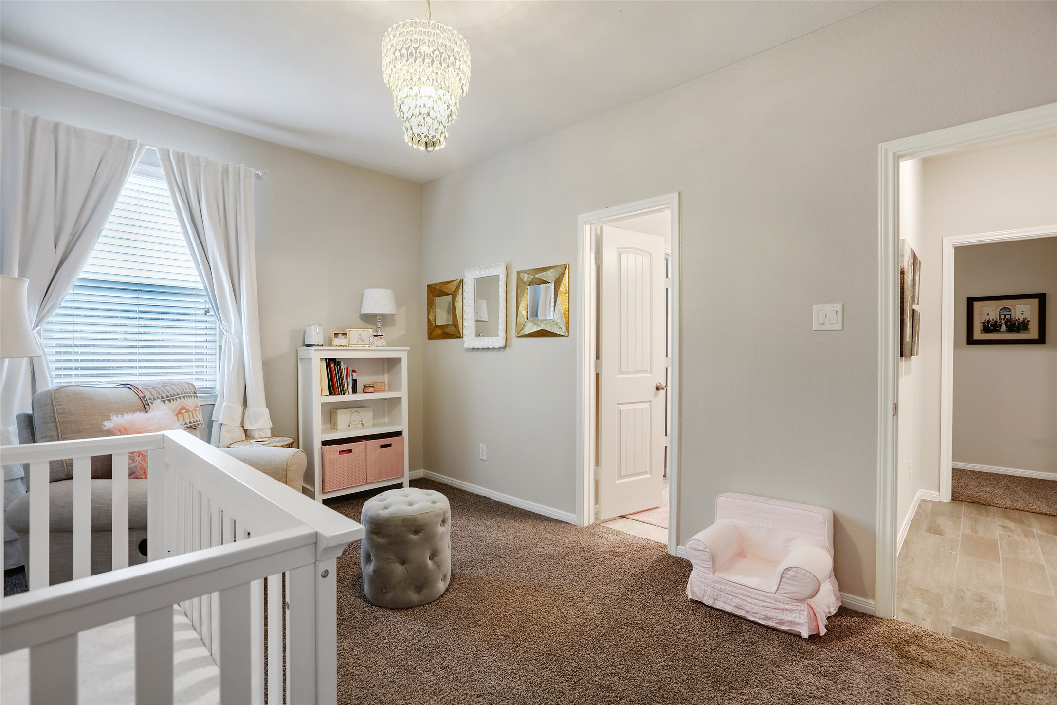 14141 Isle Royal Lane Conroe, TX 77384 - Photo 27 of 39 a bedroom with furniture and a window