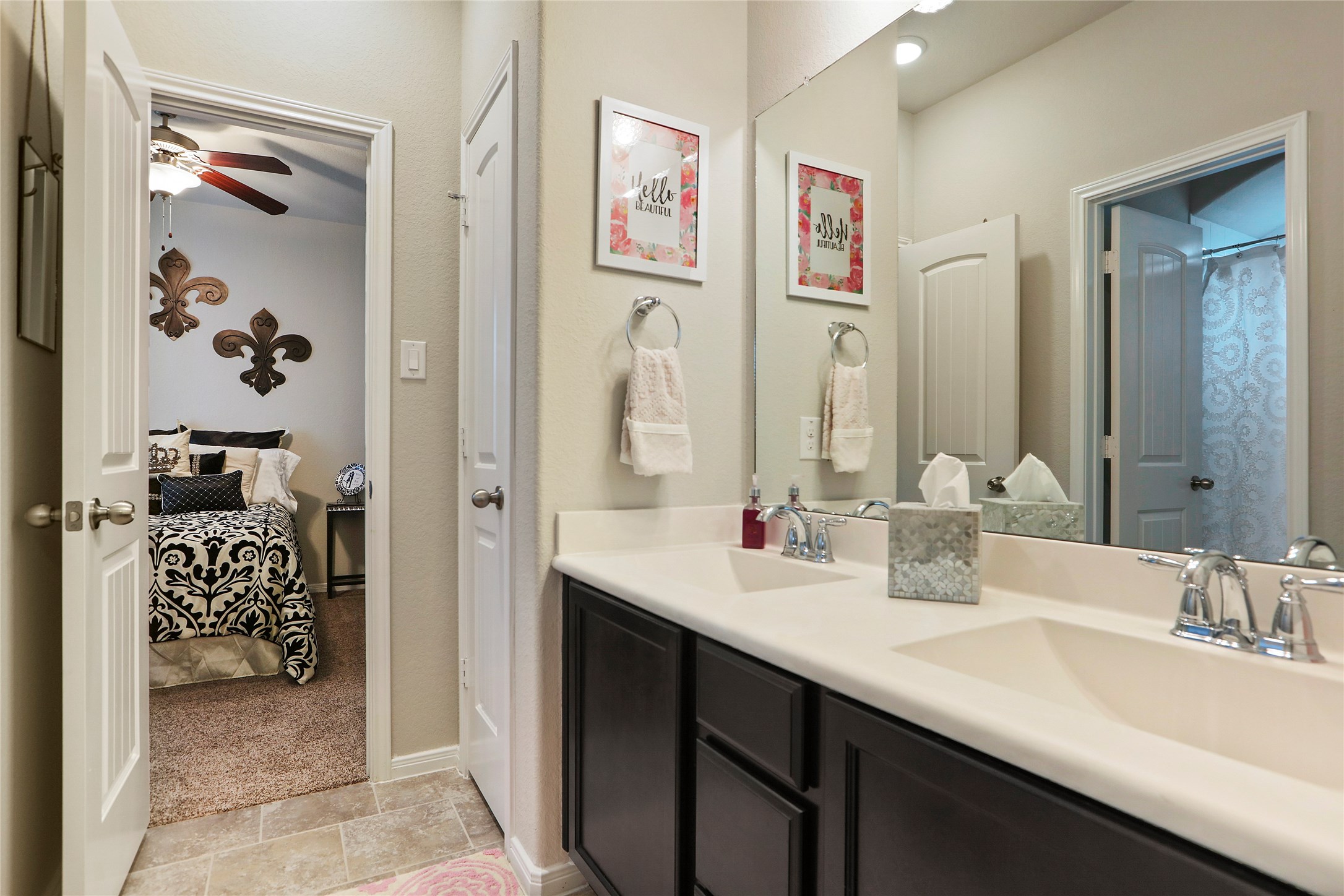 14141 Isle Royal Lane Conroe, TX 77384 - Photo 28 of 39 a bathroom with a sink and a mirror